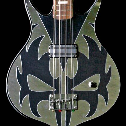 This guitar is NOT FOR SALE nor will we build anything KISS or GENE SIMMONS related.