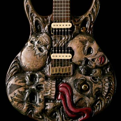 This guitar is NOT FOR SALE nor will we build anything KISS or GENE SIMMONS related.