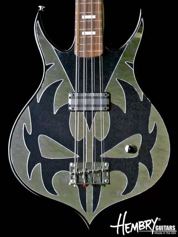 This guitar is NOT FOR SALE nor will we build anything KISS or GENE SIMMONS related.